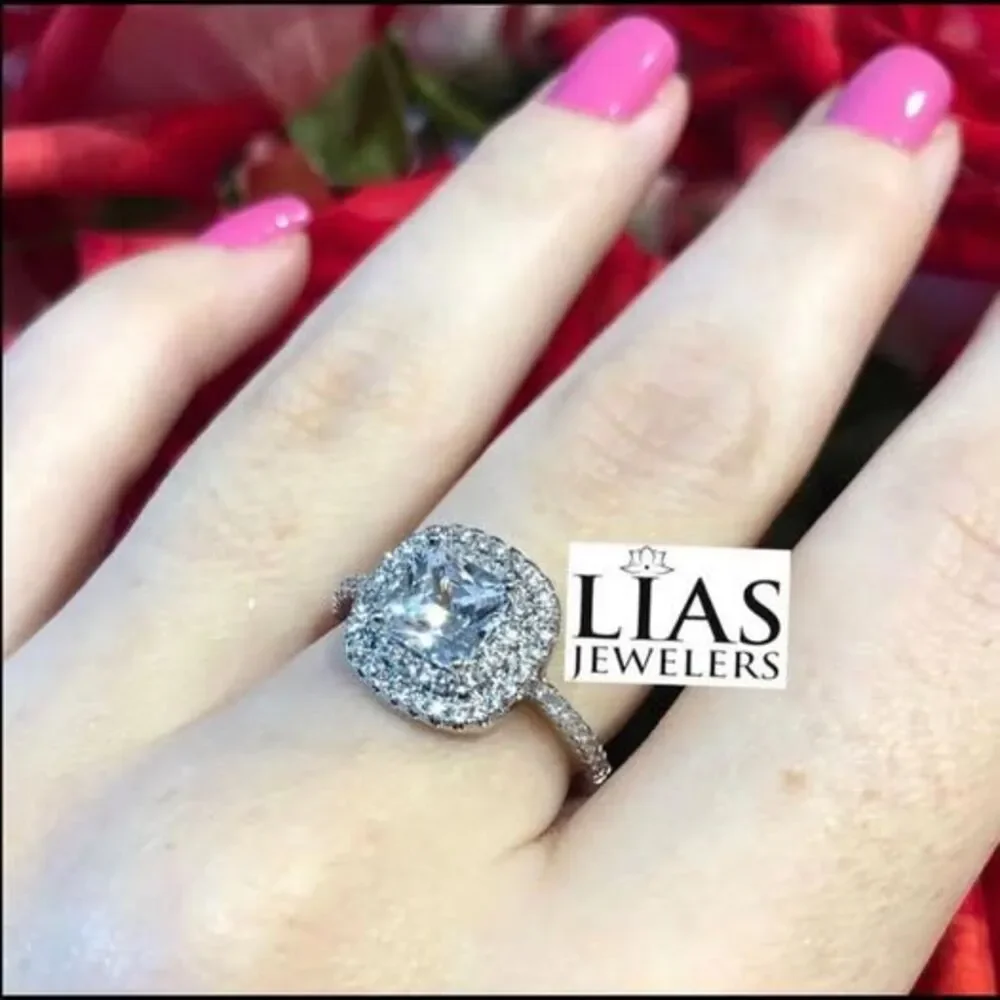 New 18k white gold engagement ring